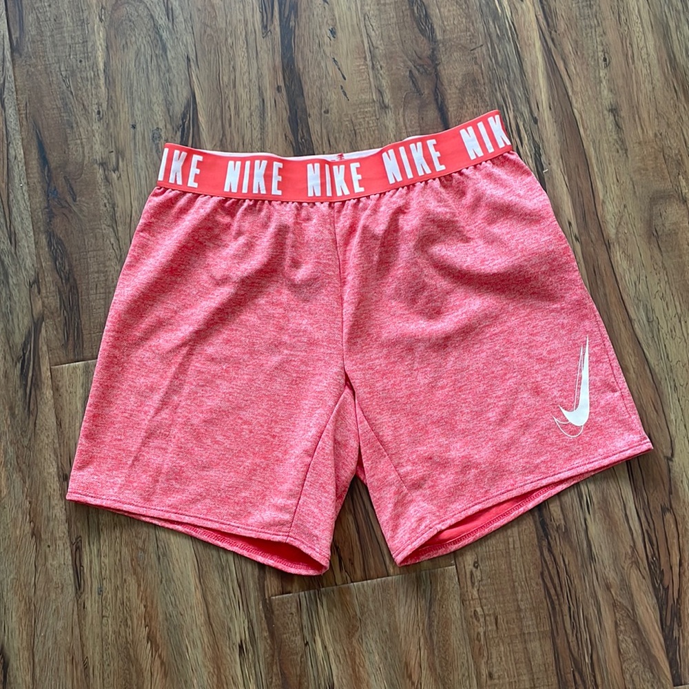 Nike Dri fit 6” girl’s shorts, size L, tight fit.